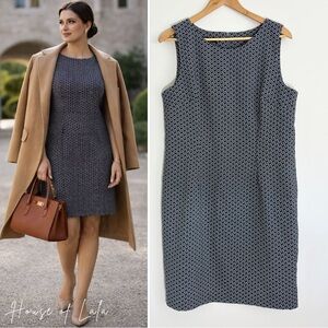 Classic Mario Serrani navy patterned sheath dress – minimalist tailoring.